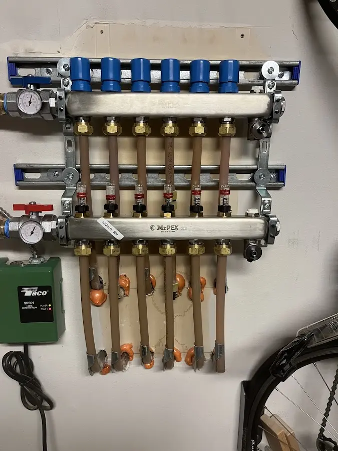 Plumber performing Gas Line Installation at a residential property in Hoosick